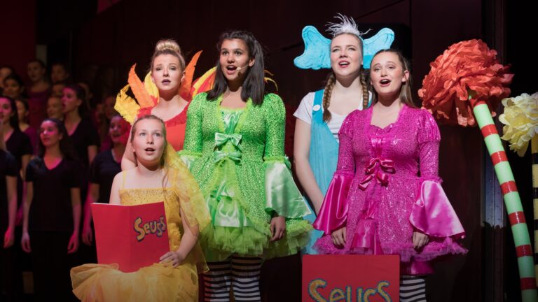 Children performing at an International School of Performing Arts holiday camp showcase